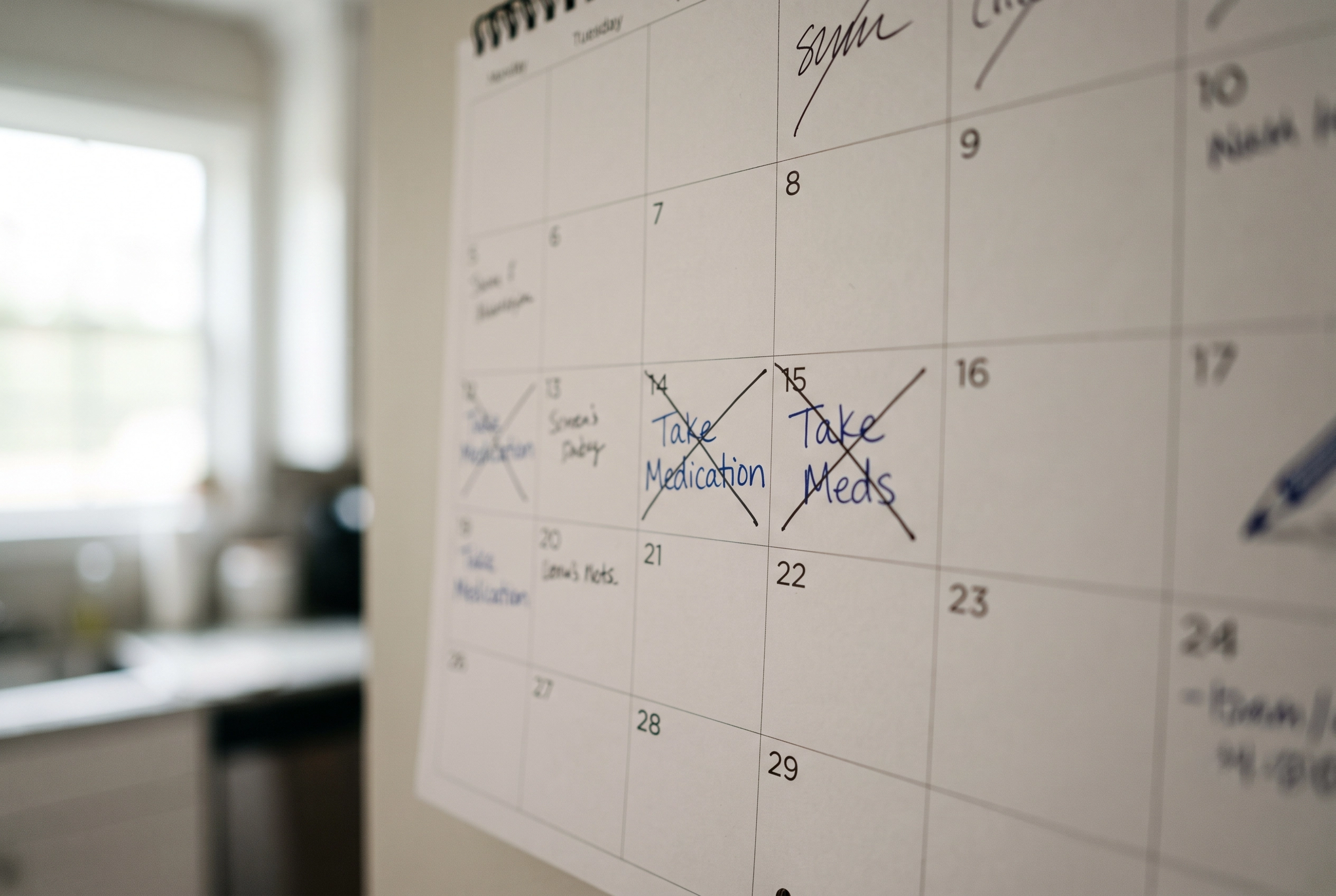 Calendar showing the importance of building a daily routine for taking medication.